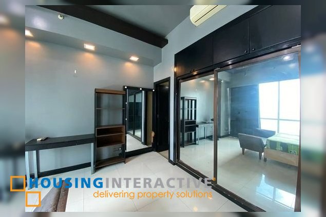 semi-furnished penthouse unit with parking for sale in the manansala