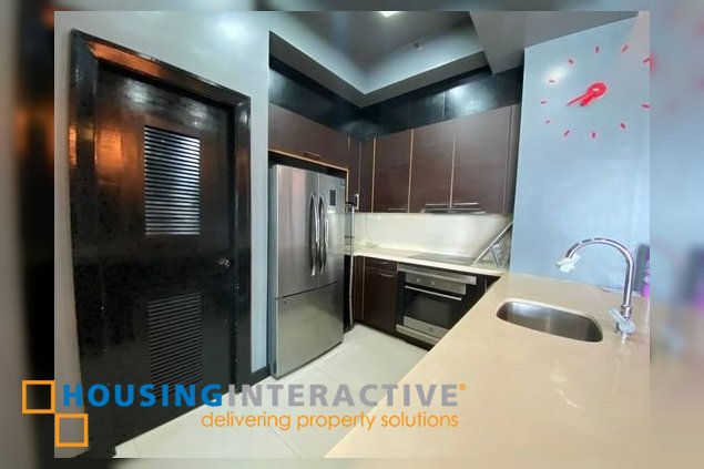 semi-furnished penthouse unit with parking for sale in the manansala