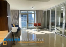 semi-furnished 2br unit with balcony and parking for sale in east gallery place