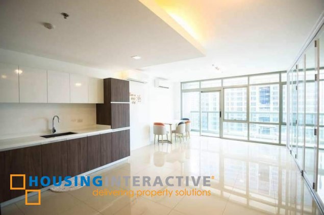 semi-furnished 2br unit with balcony and parking for sale in east gallery place