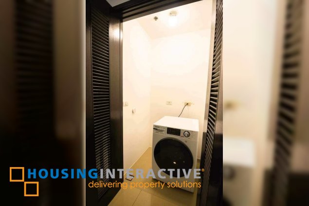 semi-furnished 2br unit with balcony and parking for sale in east gallery place