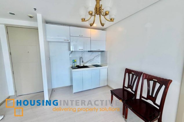 semi-furnished 2br unit with parking lot for sale/rent in bellagio 2