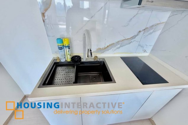 semi-furnished 2br unit with parking lot for sale/rent in bellagio 2