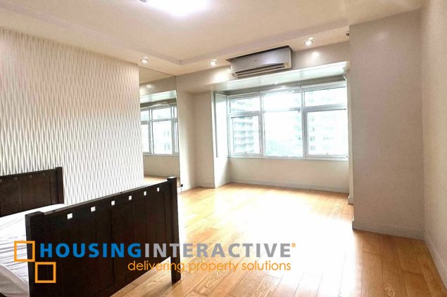 semi-furnished 2br unit with parking for rent in one serendra