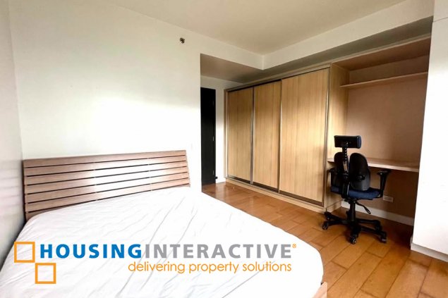 semi-furnished 2br unit with parking for rent in one serendra