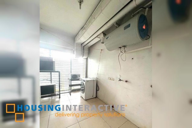 semi-furnished 2br unit with parking for rent in one serendra