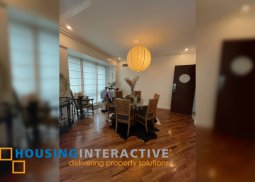 semi-furnished 2br unit wiht balcony and parking for lease in amorsolo east