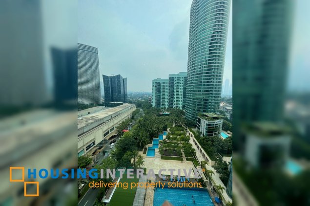semi-furnished 2br unit wiht balcony and parking for lease in amorsolo east