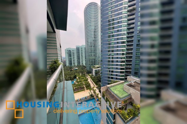 semi-furnished 2br unit wiht balcony and parking for lease in amorsolo east