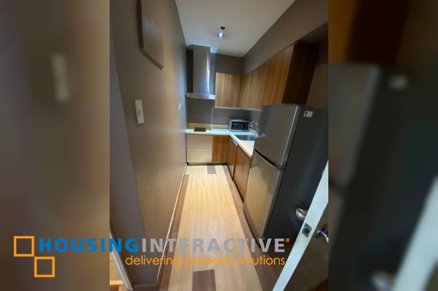 furnished 1br unit with parking for sale in gramercy residences