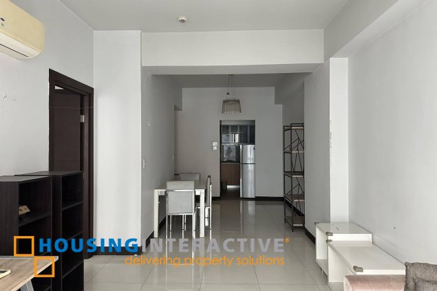 furnished 1br unit for sale in two central