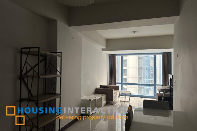 furnished 1br unit for sale in two central