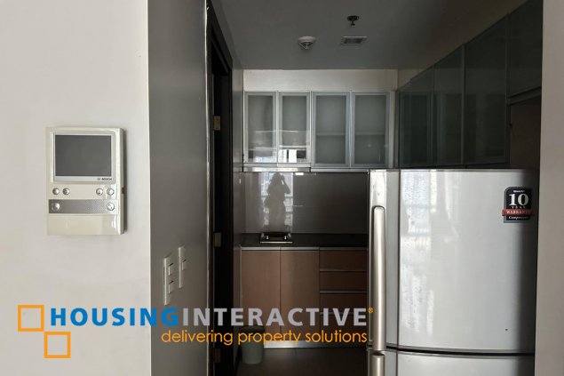 furnished 1br unit for sale in two central