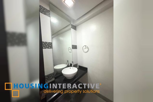 semi-furnished 2br unit with parking for lease in one serendra