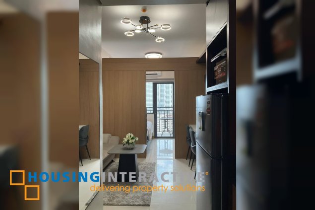 fully furnished 1br unit with balcony for lease in red residences, makati