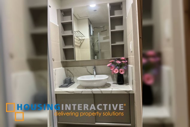 fully furnished 1br unit with balcony for lease in red residences, makati