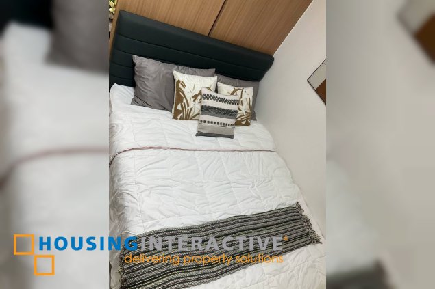 fully furnished 1br unit with balcony for lease in red residences, makati