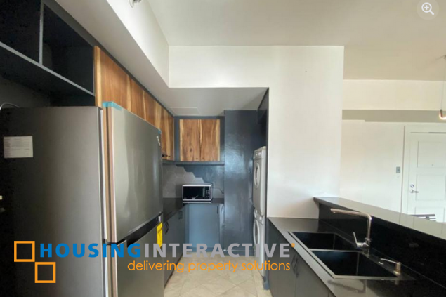 furnished 1br unit with balcony and parking for lease in the manansala