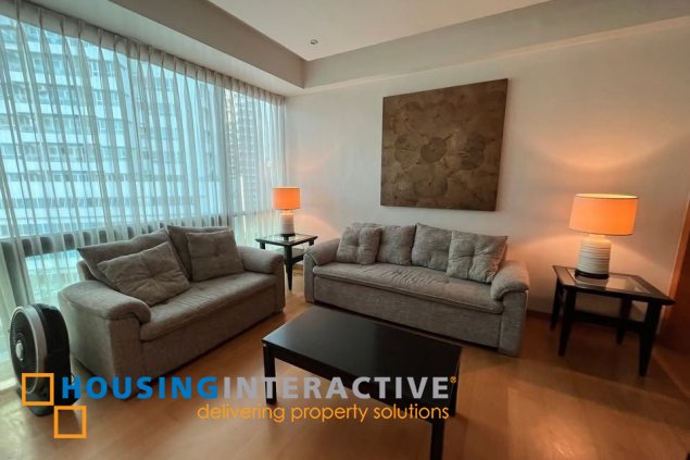 fully furnished 2br unit with parking for sale in bonifacio ridge