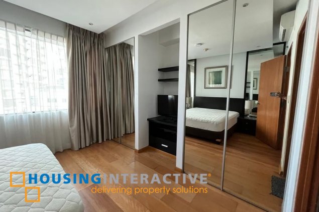 fully furnished 2br unit with parking for sale in bonifacio ridge