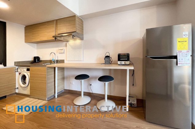 fully furnished 1br unit with balcony for lease in the rise