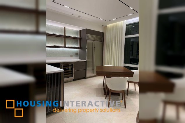 fully furnished 3br unit with parking for sale in two roxas triangle