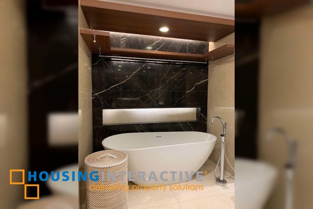 fully furnished 3br unit with parking for sale in two roxas triangle