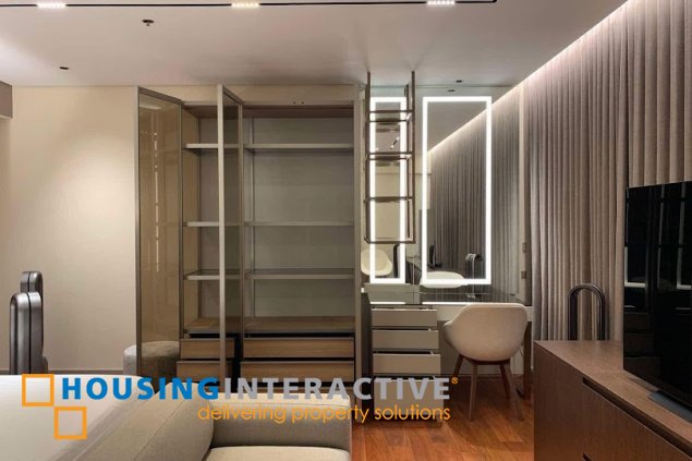 fully furnished 3br unit with parking for sale in two roxas triangle