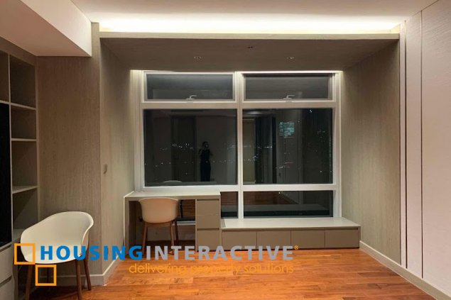 fully furnished 3br unit with parking for sale in two roxas triangle