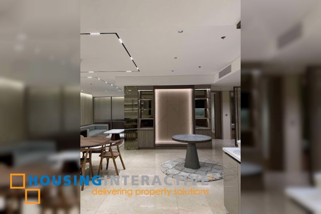 fully furnished 3br unit with parking for sale in two roxas triangle