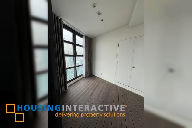 semi-furnished 3br unit with 2 parkings for sale in garden towers