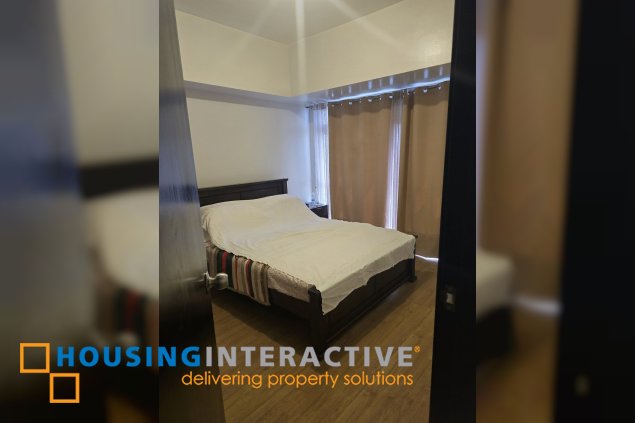 semi-furnished 1br unit with balcony and parking for lease in park triangle residences