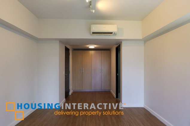 semi-furnished 3br unit with balconya and parking for sale in two maridien