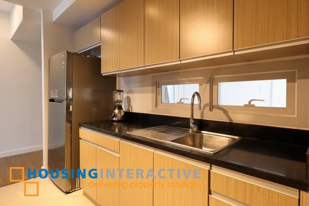 semi-furnished 3br unit with balconya and parking for sale in two maridien