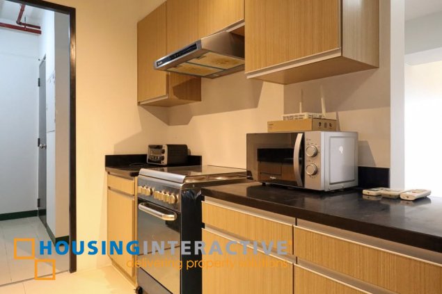 semi-furnished 3br unit with balconya and parking for sale in two maridien