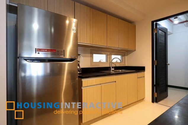 semi-furnished 3br unit with balconya and parking for sale in two maridien