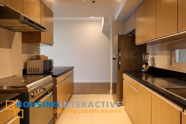 semi-furnished 3br unit with balconya and parking for sale in two maridien