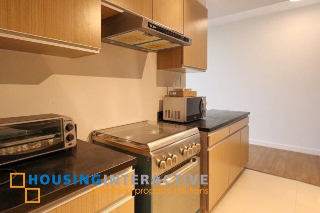 semi-furnished 3br unit with balconya and parking for sale in two maridien