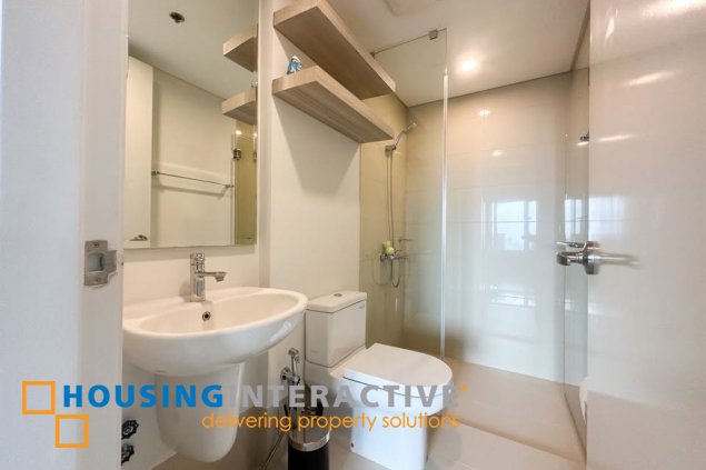 fully furnished 2br unit with balcony and parking for sale in arya residences