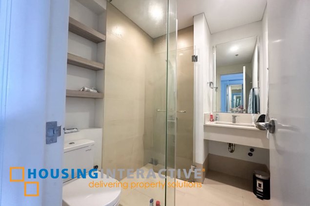 fully furnished 2br unit with balcony and parking for sale in arya residences