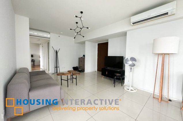 fully furnished 2br unit with balcony and parking for sale in arya residences