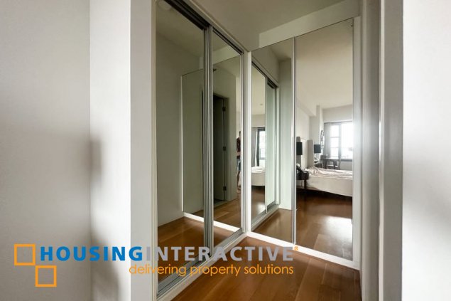 fully furnished 2br unit with balcony and parking for sale in arya residences