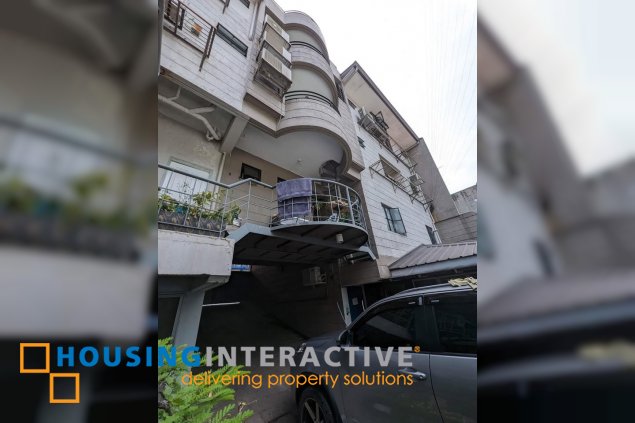 3floors commercial building with basement and roof deck.