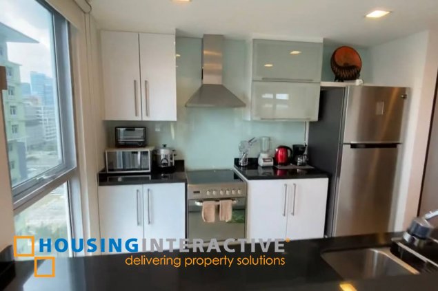 fully furnished 2br unit with parking for sale in one serendra
