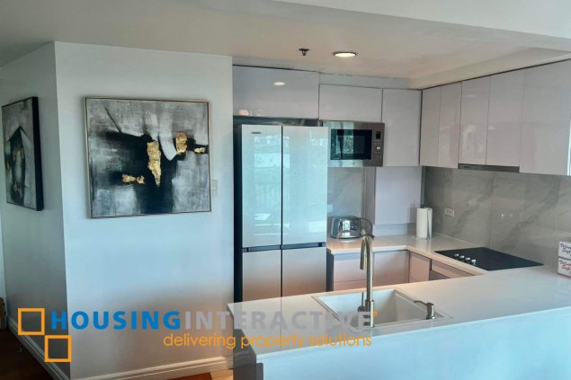furnished 1br unit with parking for sale in one rockwell