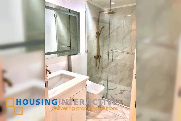 furnished 1br unit with parking for sale in one rockwell