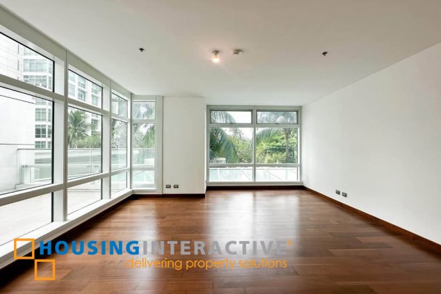 semi-furnished 3br unit with parking for sale in two roxas triangle