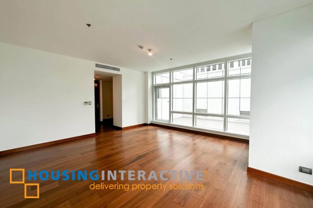 semi-furnished 3br unit with parking for sale in two roxas triangle