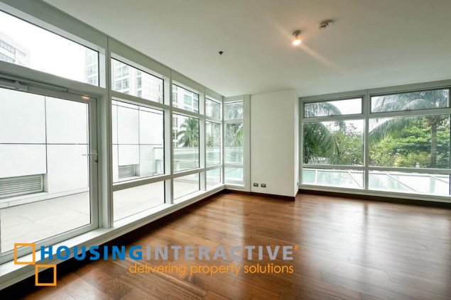 semi-furnished 3br unit with parking for sale in two roxas triangle