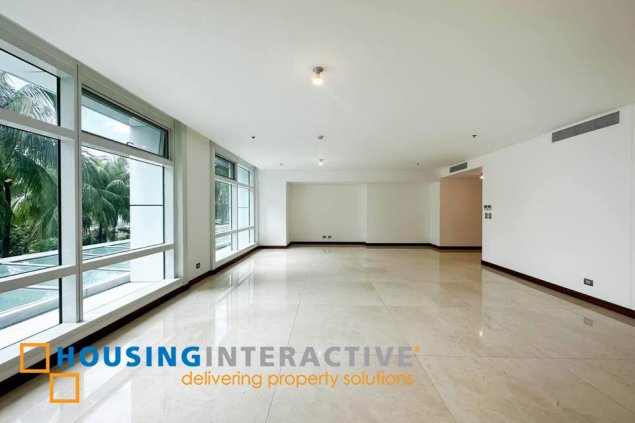 semi-furnished 3br unit with parking for sale in two roxas triangle